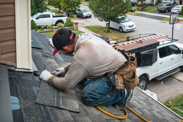 Professional Roofing technician working in Bloomfield, NY
